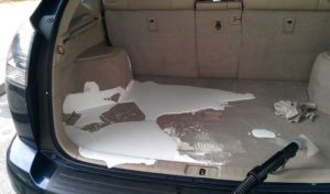 milk spill in car trunk